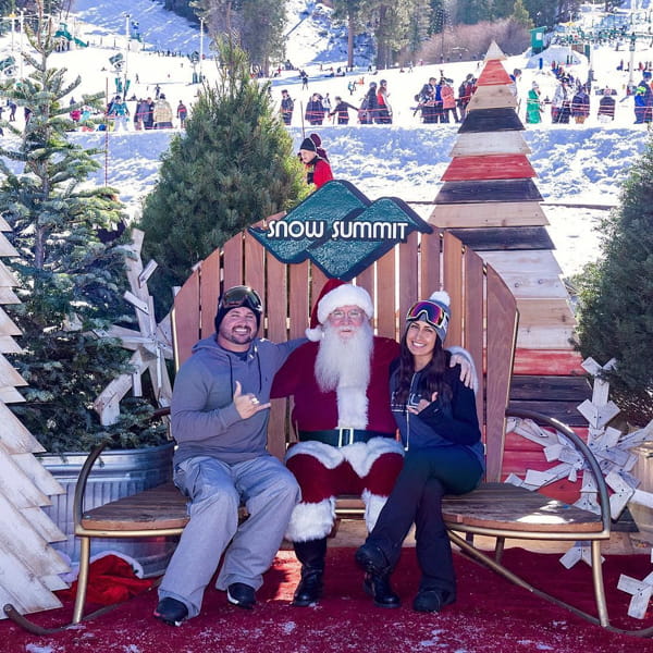 Family taking a photo with Santa
